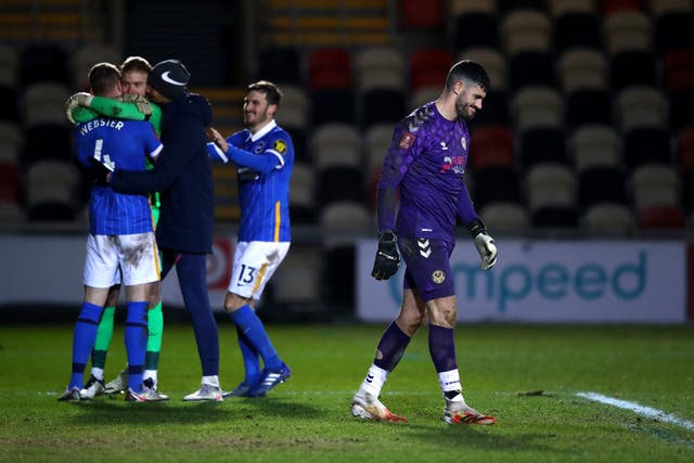 Jason Steele is congratulated by his Brighton teammates