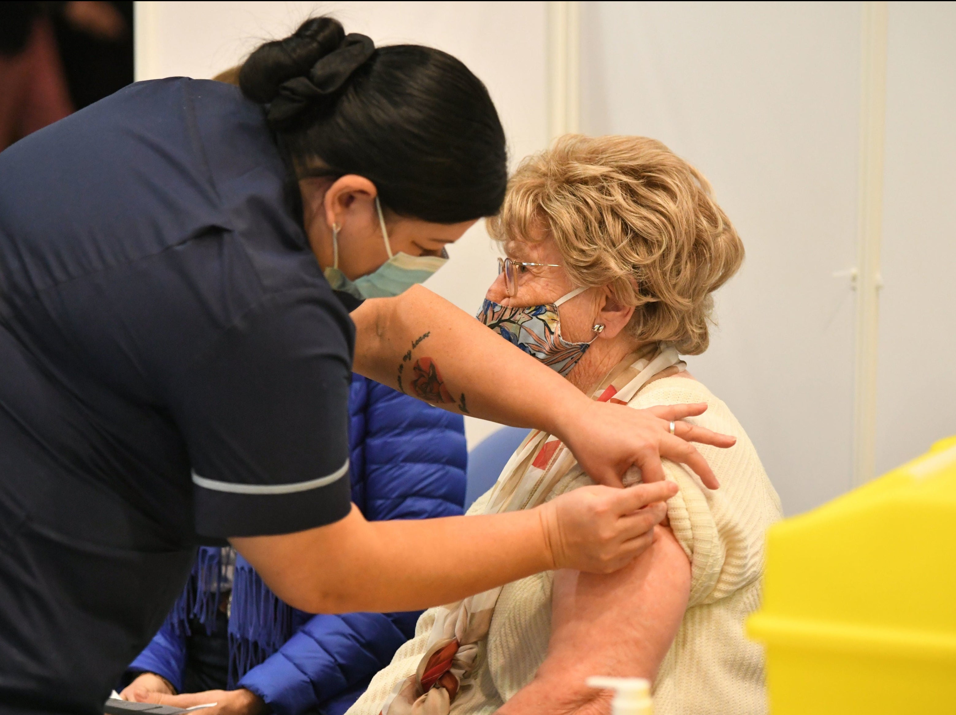 Moira Edwards, 88, gets a Covid jab at the Epsom Downs vaccine centre in Surrey