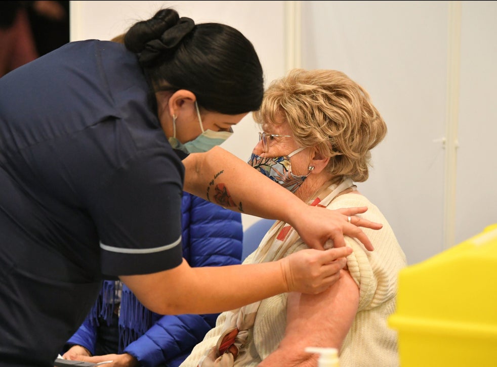 Moira Edwards, 88, receives the Oxford/AstraZeneca Covid-19 vaccine at an NHS vaccine centre set up at Epsom Downs Racecourse