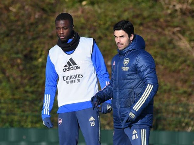 Arsenal manager Mikel Arteta and Nicolas Pepe