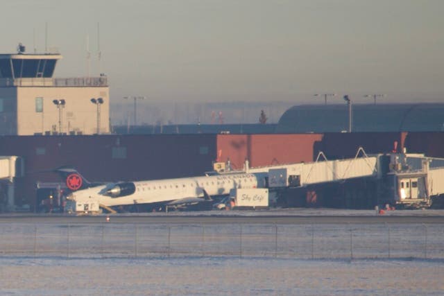The Air Canada plane’s nose tipped upwards