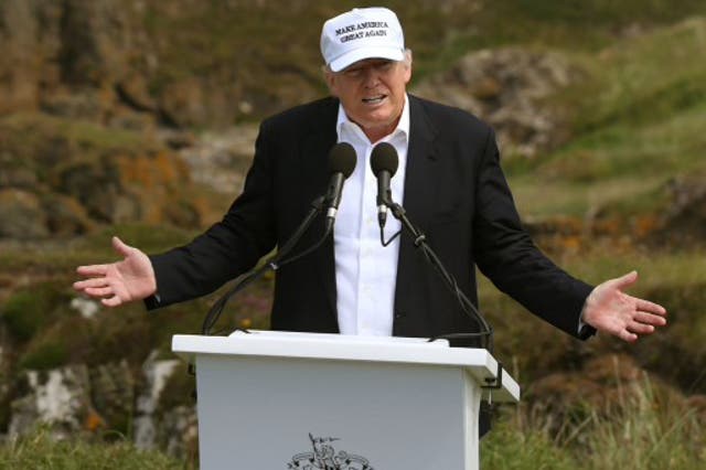 <p>Donald Trump speaks at Turnberry golf course in June 2016, a year after he bought it.&nbsp;</p>