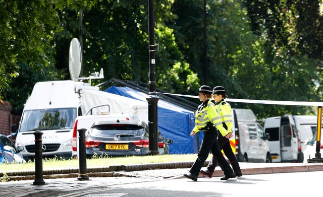 <p>Police outside Forbury Gardens in Reading, where an Islamist terrorist murdered three friends in the park in June 2020 </p>