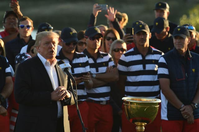 <p>Donald Trump speaks during the trophy presentation of the Presidents Cup in 2017</p>