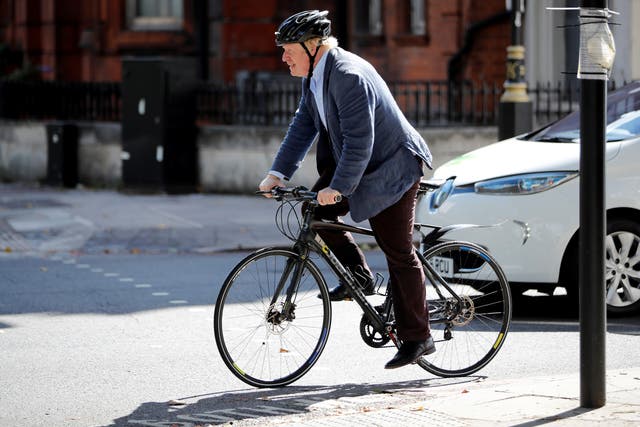 <p>A file photo shows Boris Johnson out on his bike.&nbsp;</p>