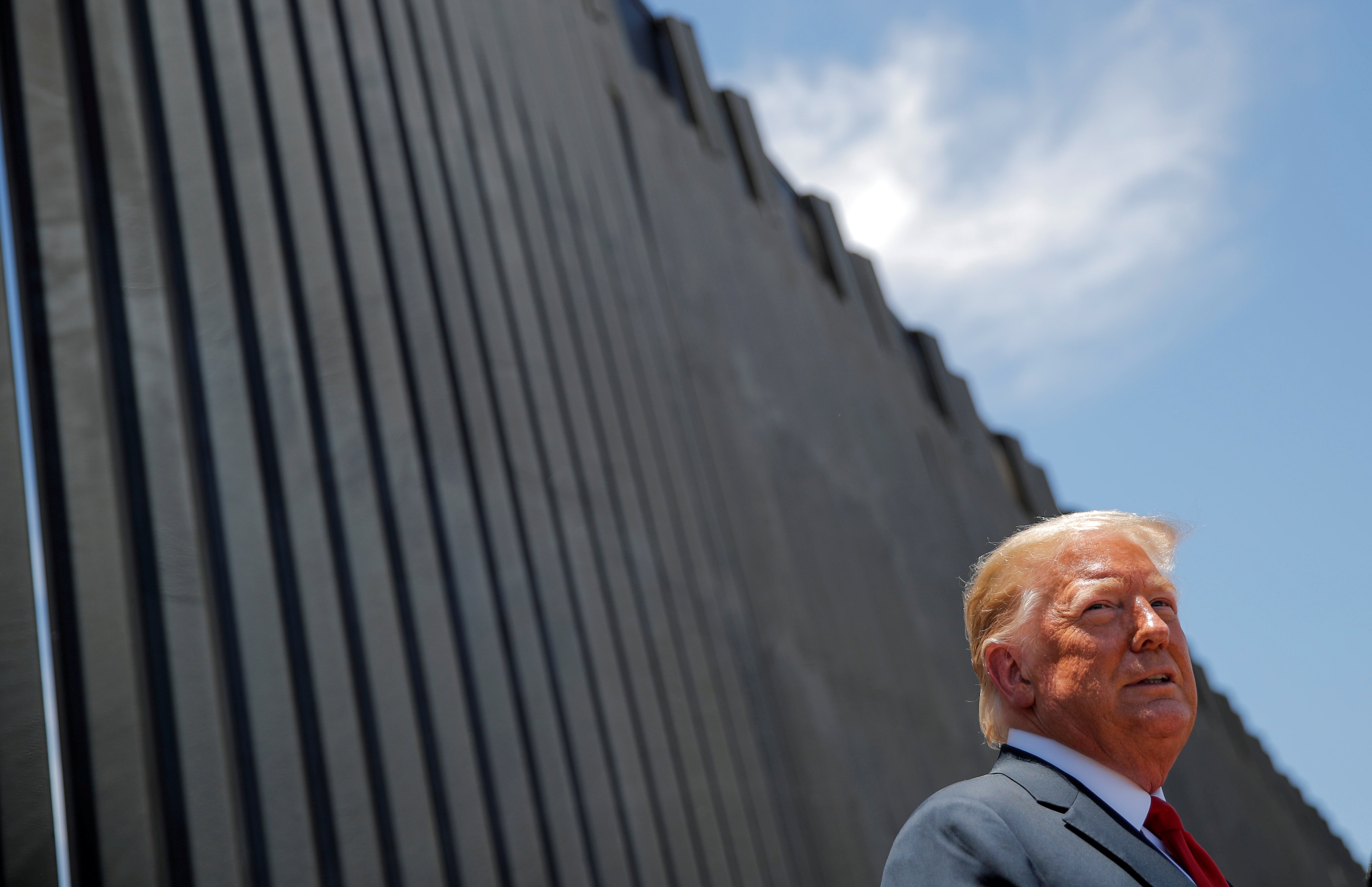 FILE PHOTO: US President Trump visits the US-Mexico border in San Luis, Arizona