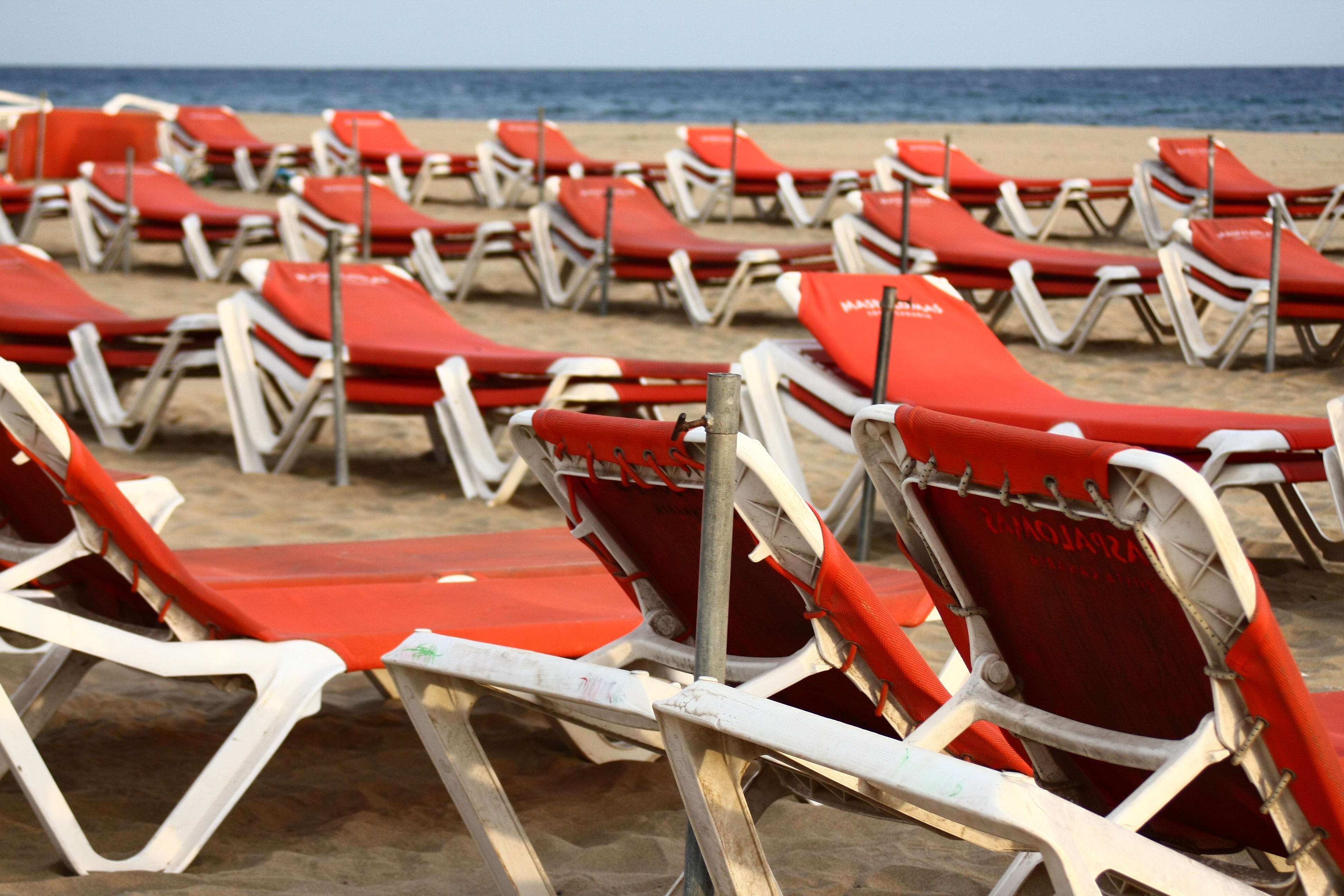 Empty quarter: sunbeds on the beach at Maspalomas on the island of Gran Canaria