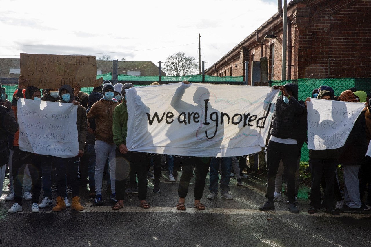 Asylum seekers protest about conditions of the Napier Barracks