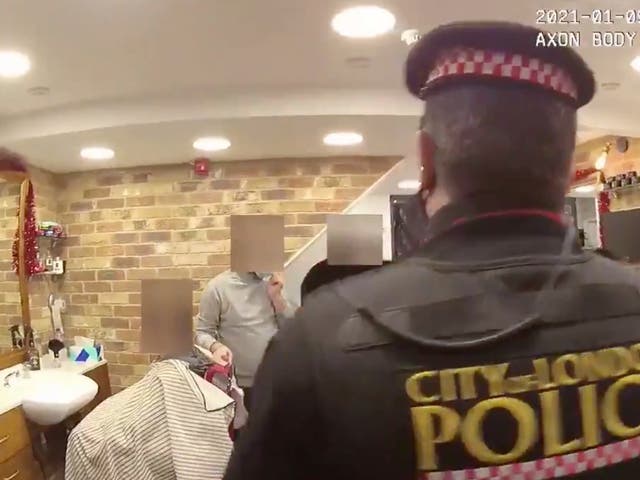 Police bodycam footage showed people receiving haircuts in a City barber’s