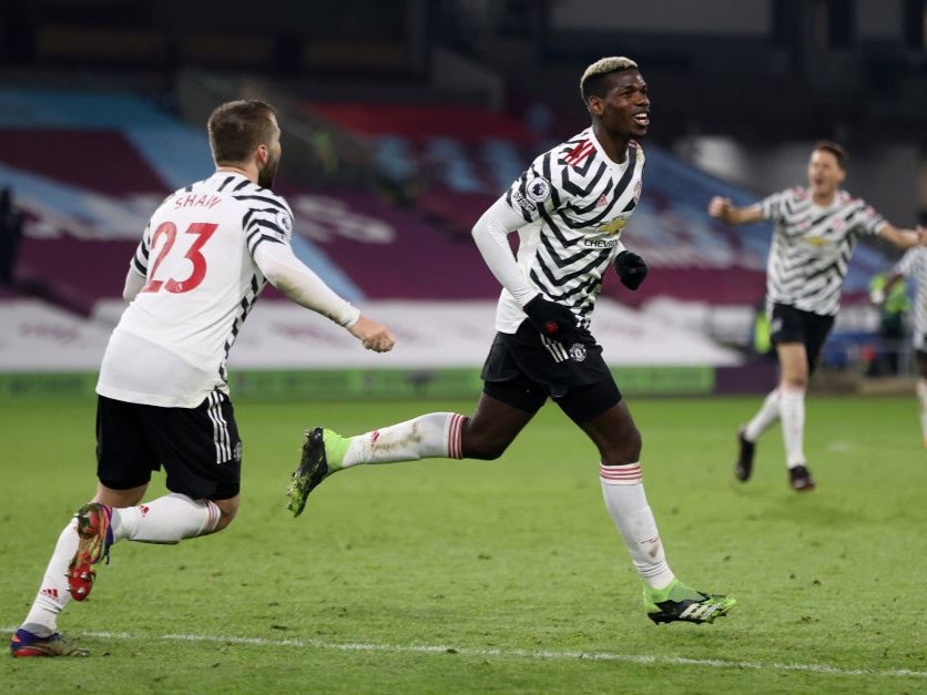Pogba celebrates his winning goal against Burnley