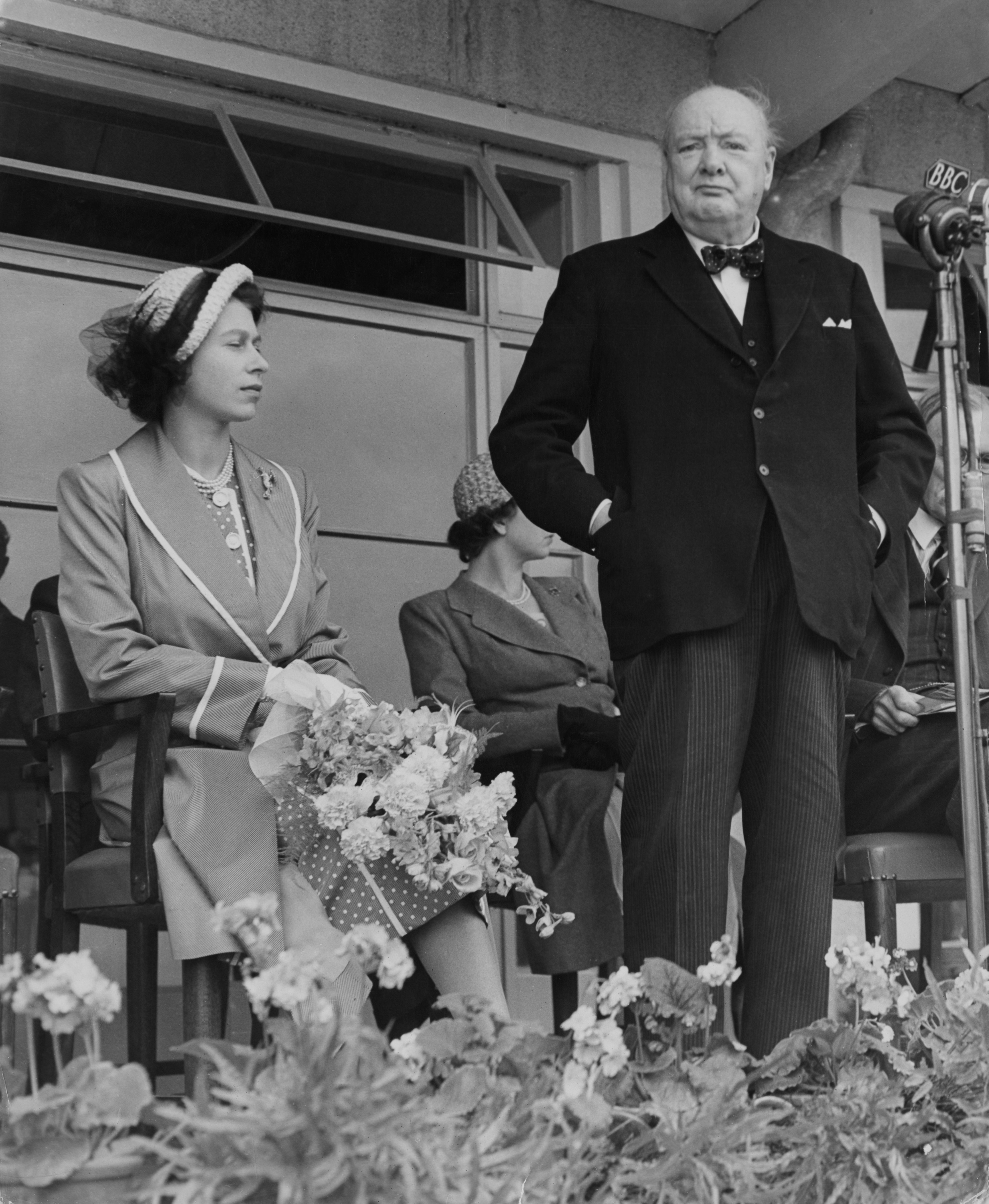 Winston Churchill and the Queen at the opening of the International Youth Centre at Chigwell, Essex, 12 July 1951
