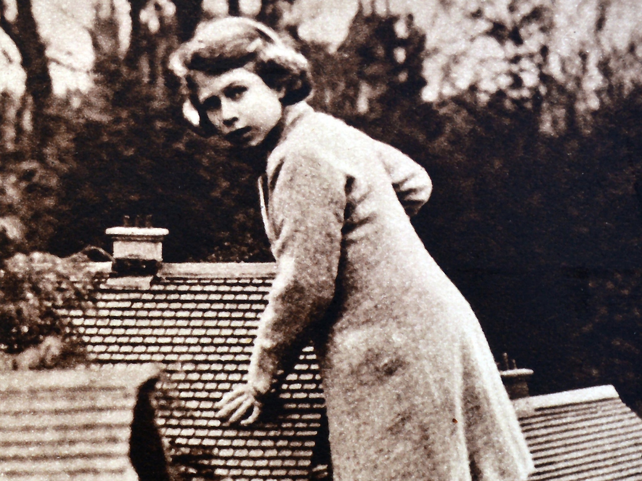 Princess Elizabeth playing at the Bekonscot model village in Buckinghamshire in 1935