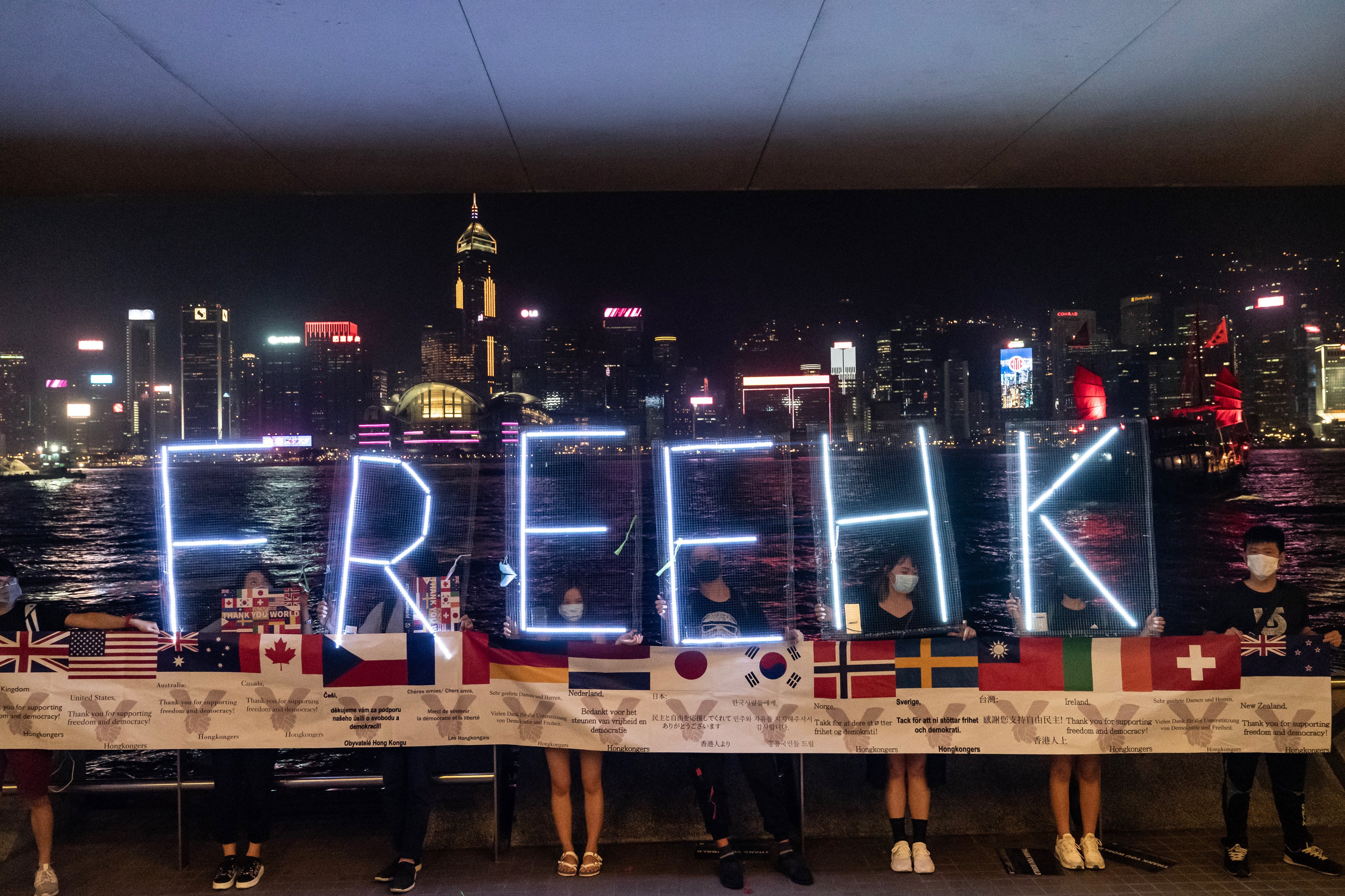 Pro-democracy protesters hold up a ‘Free HK’ LED sign during a demonstration on 30 September, 2019 in Hong Kong, China.