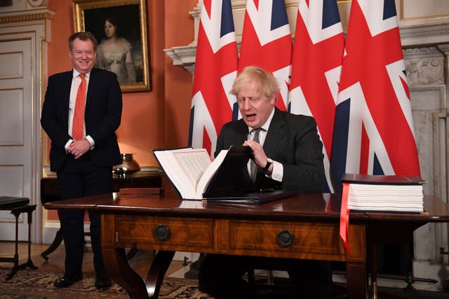 <p>Boris Johnson signs the Trade and Cooperation Agreement</p>