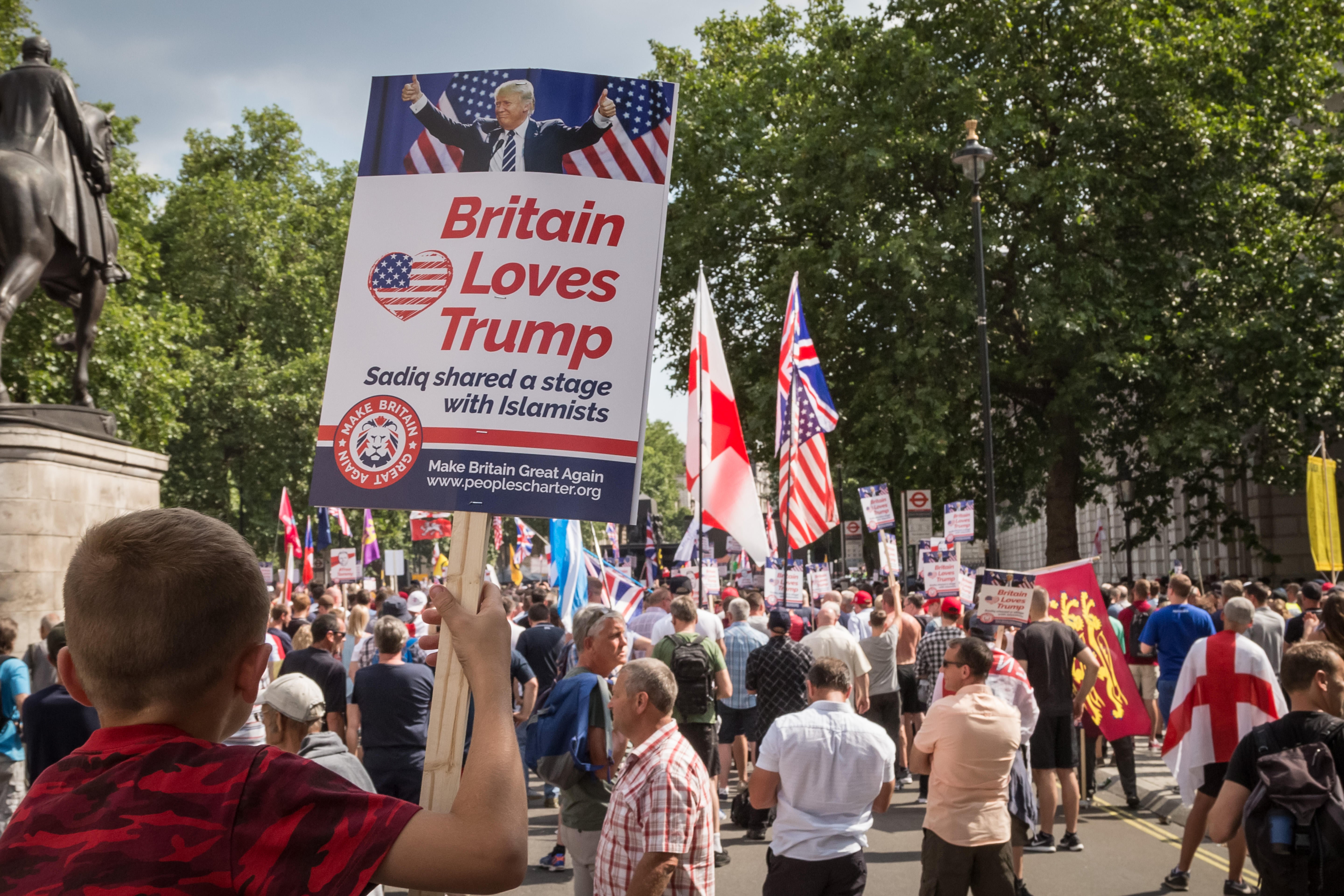 A child holds placard by Ukip affiliate ‘Make Britain Great Again’ at a 2018 protest in London