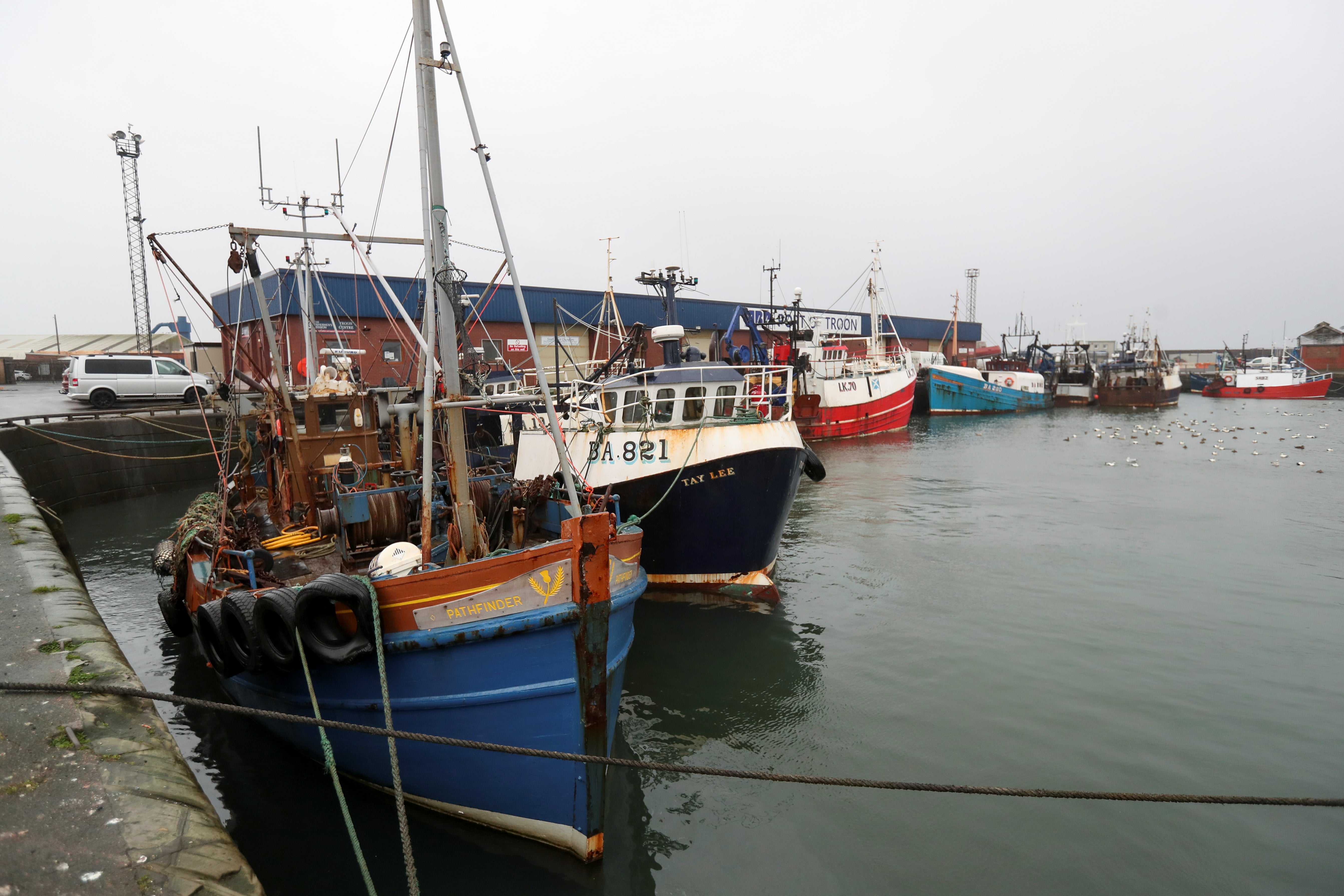 Industry groups report that many Scottish fishing boats stand idle due to the export crisis