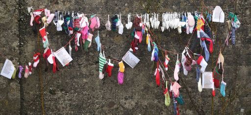 Children's socks at the grotto on an unmarked mass grave at the site of the Tuam Mother and Baby Home run by the Bon Secours sister