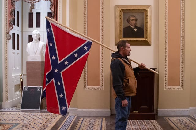 <p>Trump supporter who brought Confederate flag into Capitol arrested</p>