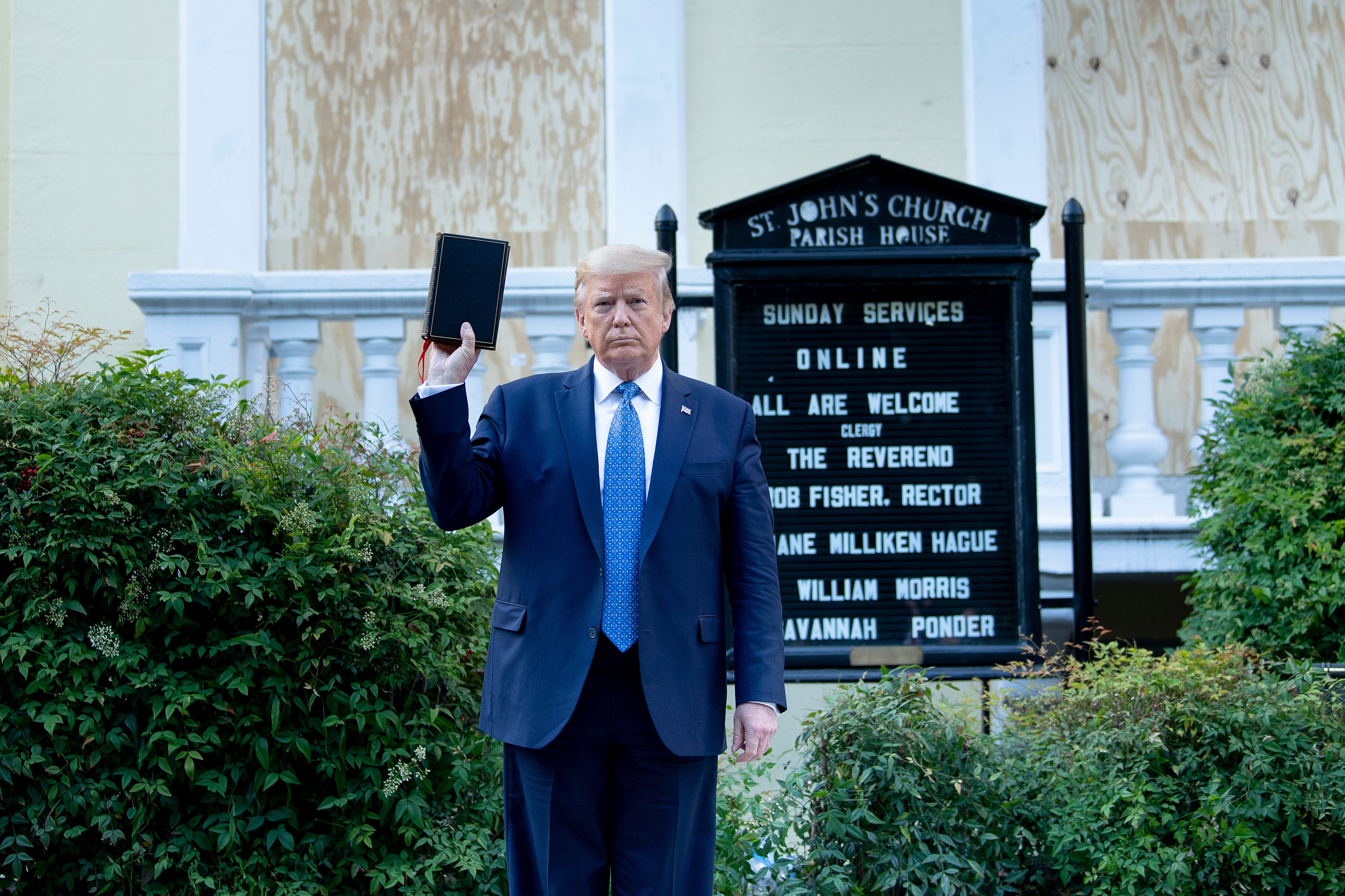 Donald Trump holds a Bible while visiting St John’s Church across from the White House amid George Floyd protests on 1 June, 2020