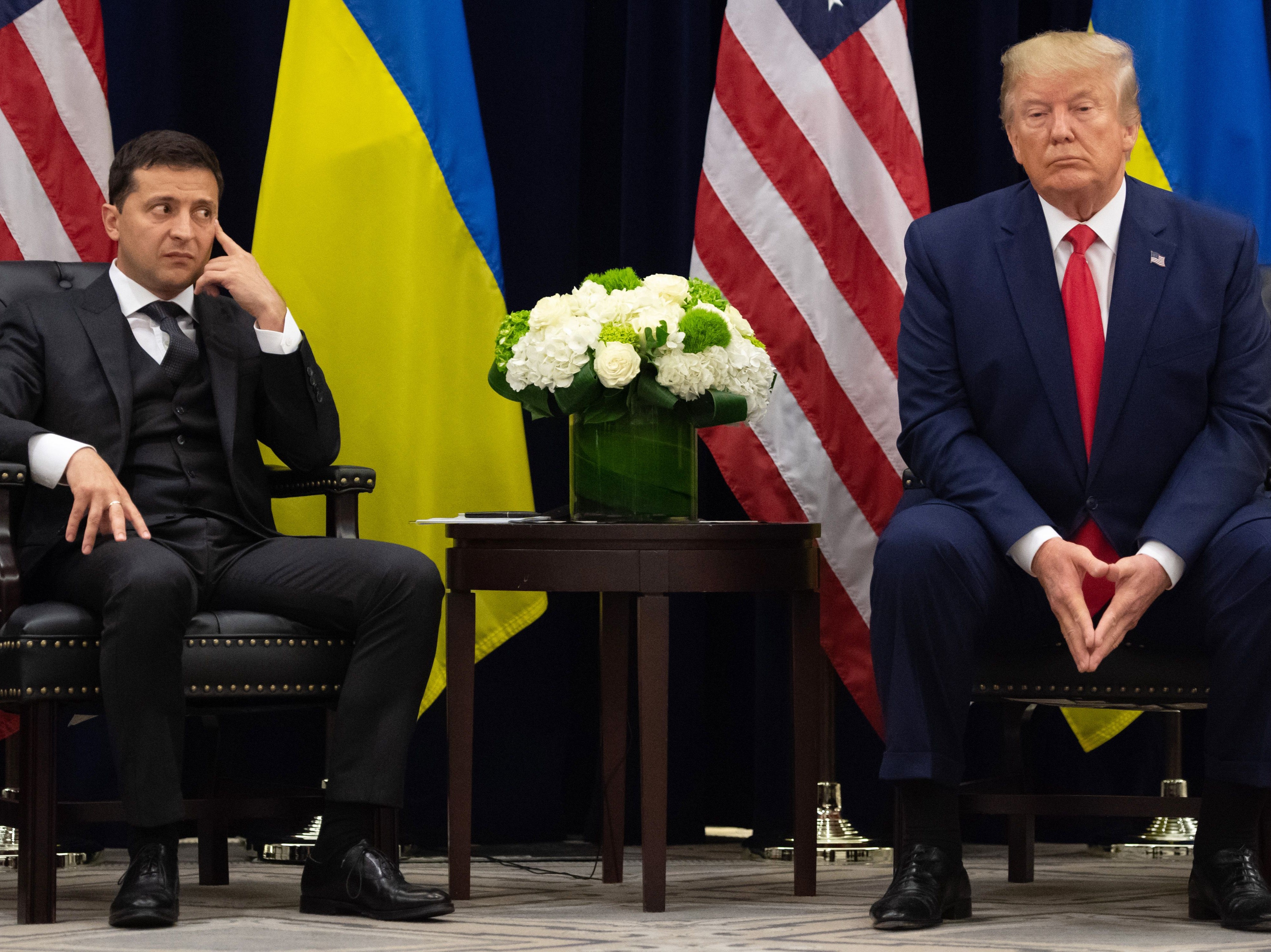 US President Donald Trump and Ukrainian President Volodymyr Zelensky looks on during a meeting in New York