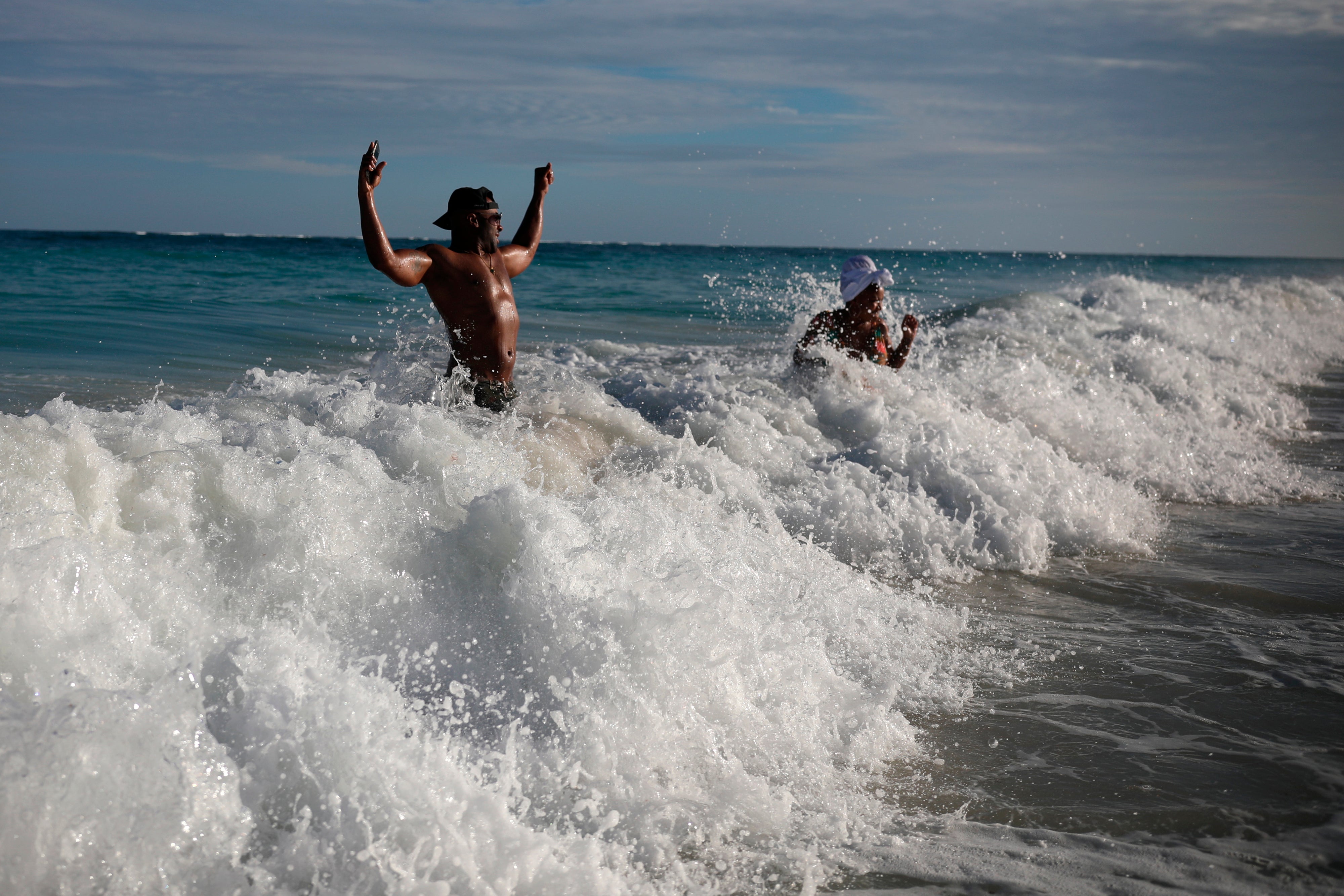 Tourists in the sea in Tulum, Quintana Roo state, earlier this month