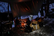 Stuck in Bosnia, migrants sleeping rough face up to winter