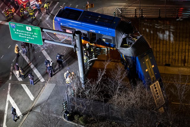 APTOPIX Bus Crash Overpass