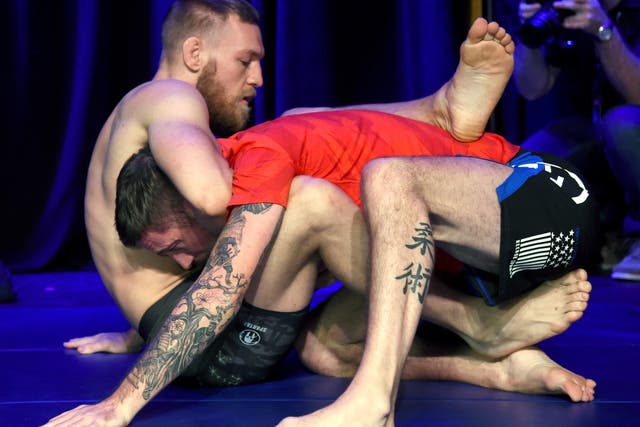 Conor McGregor trains with coach John Kavanagh in 2016