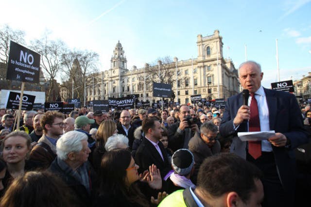 <p>Jonathan Arkush, the then president of the Board of Deputies of British Jews, speaks during a 2018 protest against antisemitism in the Labour Party in Parliament Square, London</p>