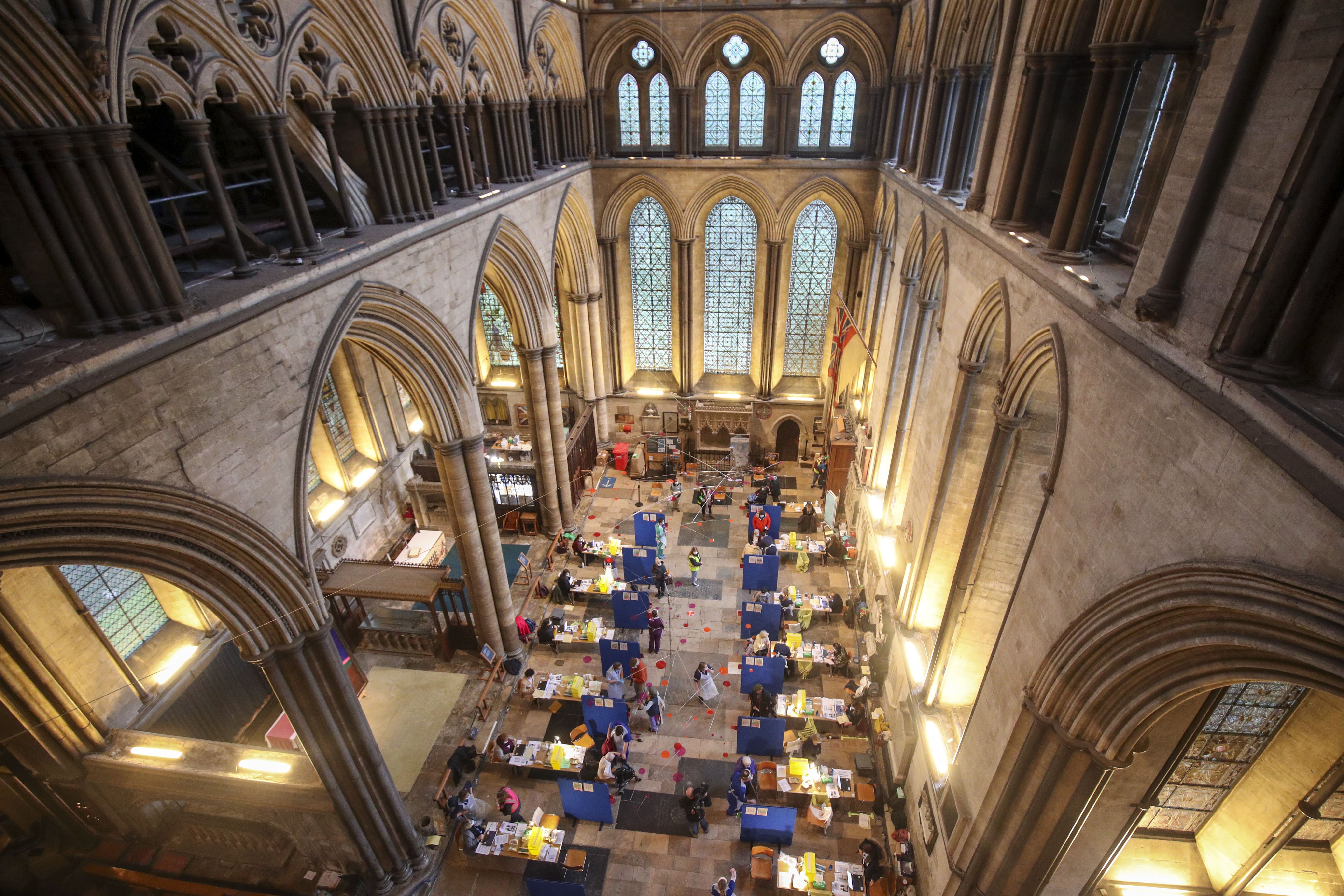 Cubicles erected inside Salisbury Cathedral, Wiltshire, for people to receive an injection of the Pfizer coronavirus vaccine.
