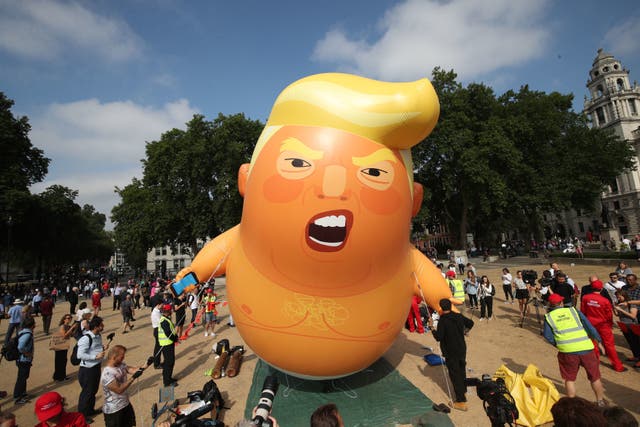 <p>‘Baby Trump’ balloon rising after being inflated in London’s Parliament Square, as part of the protests against Donald Trump’s visit to the UK.&nbsp;</p>