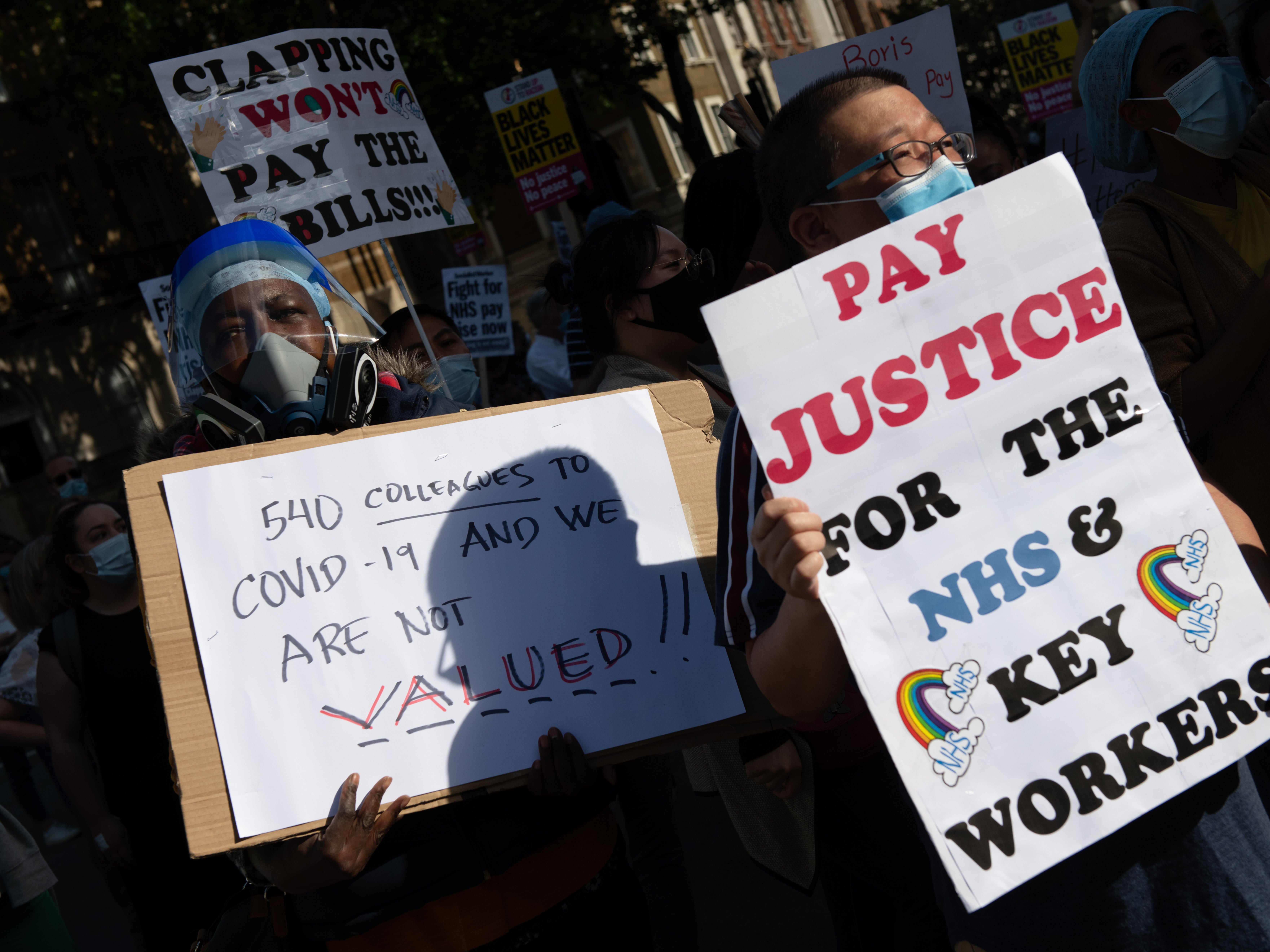 NHS staff protest outside Downing Street, in London, as they demand a pay rise on 29 July 2020 