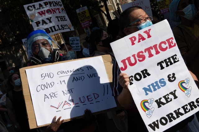 NHS staff protest outside Downing Street, in London, as they demand a pay rise on 29 July 2020 