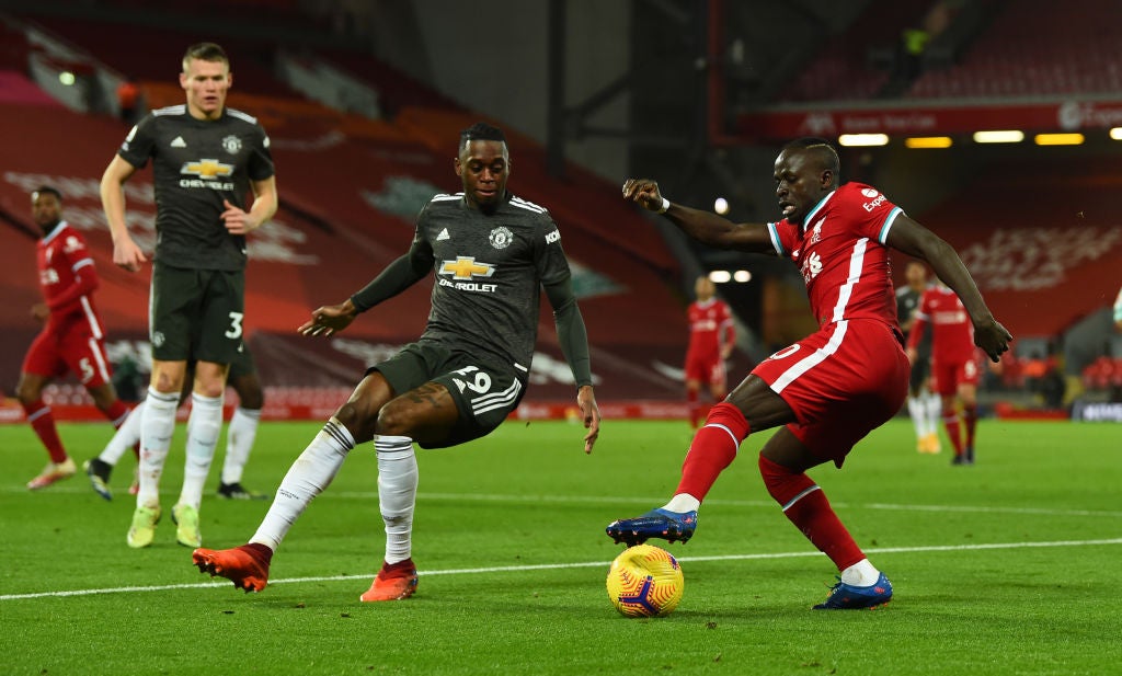 Sadio Mane takes on Aaron Wan-Bissaka