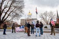 Armed protesters gather at state capitols of Ohio, Michigan, elsewhere