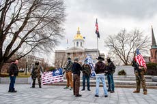 Armed protesters gather at state capitols of Ohio, Michigan, elsewhere