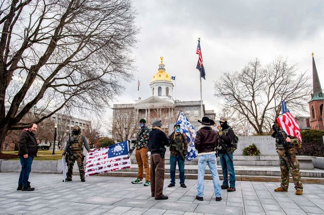 Armed far-right militia members gathered at the statehouse in Concord, New Hampshire, on Sunday.