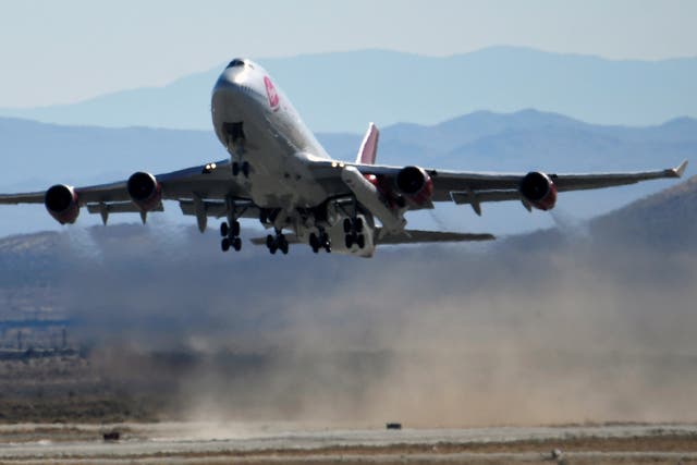 Virgin Orbit, a modified Boeing 747 jetliner carrying a rocket under its wing, during a test launch in Mojave, California  
