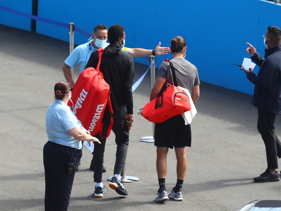 Players arrive for practice sessions at Melbourne Park