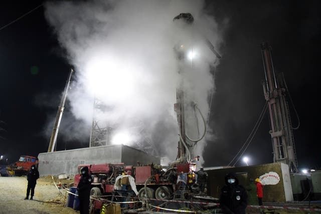 <p>Rescuers are drilling a shaft at the explosion site of a gold mine in Qixia, China to rescue the workers trapped underground</p>