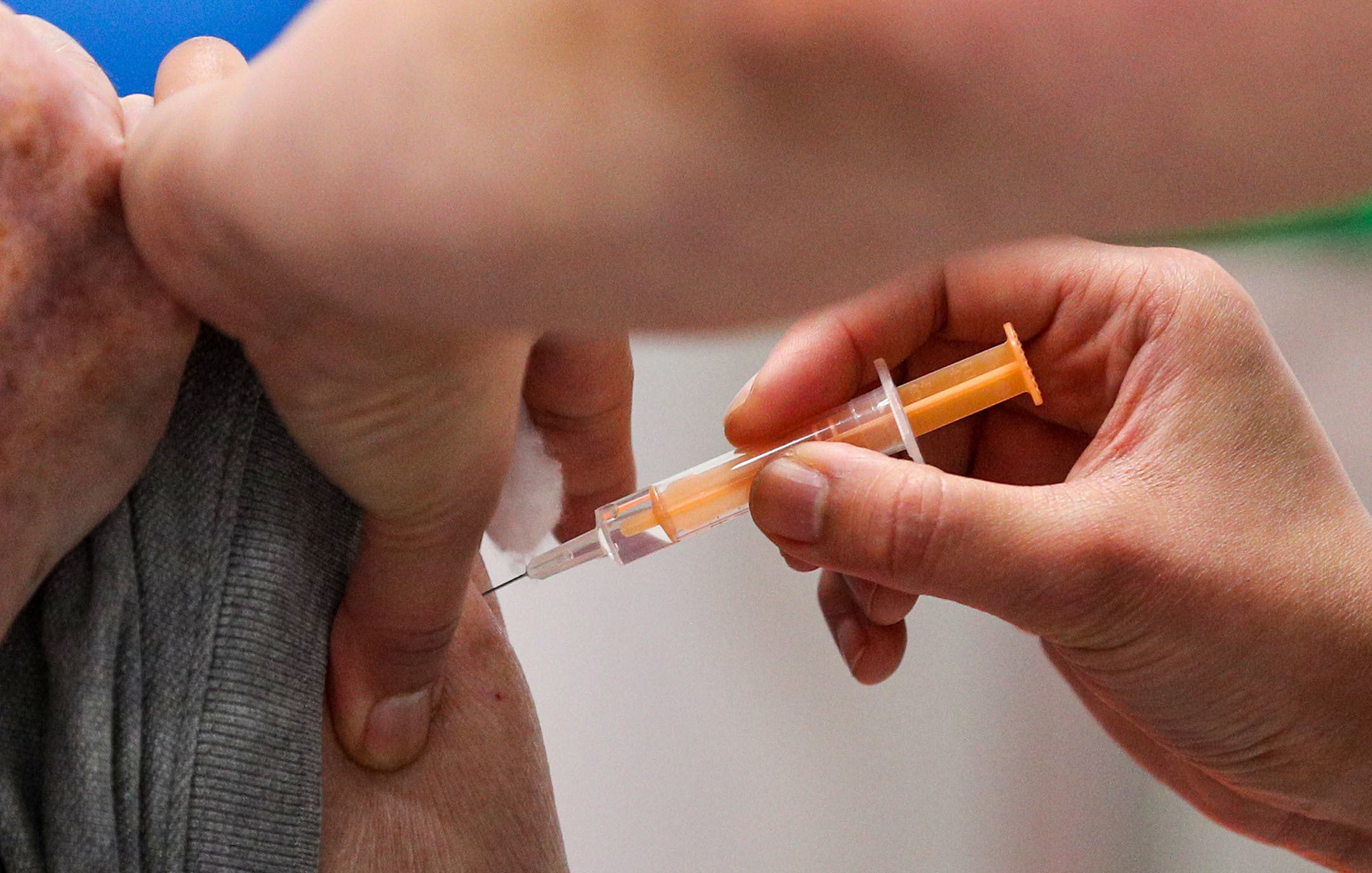 A patient is given a coronavirus vaccine