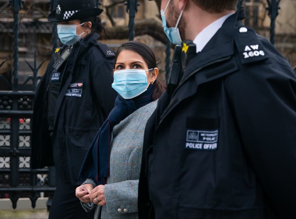 Home Secretary Priti Patel walks towards Westminster Bridge, whilst on patrol with Metropolitan Police officers in central London