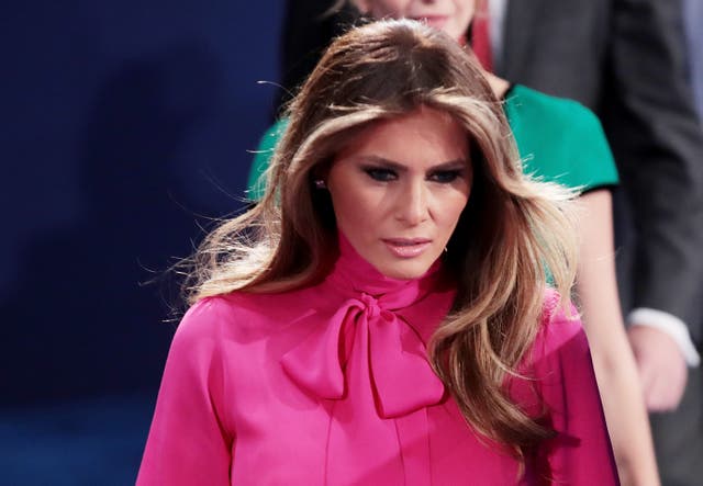 Melania may have sent a message with her pussy-bow blouse