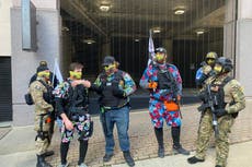 Despite fears of violence, militias lay low following Capitol attack