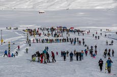 AP Photos: Snow fills Kashmir resort with tourists again