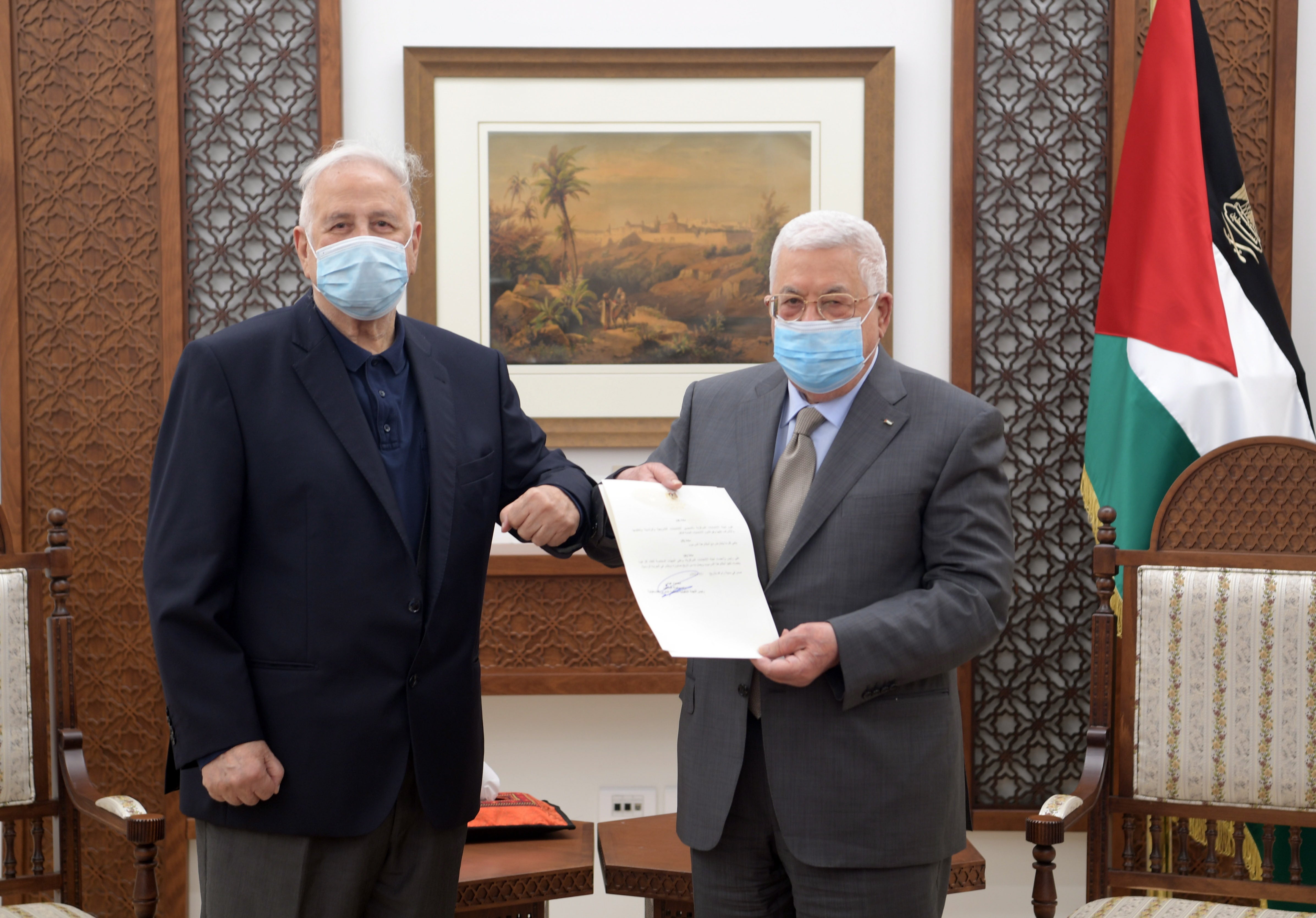 President Abbas (right) issued a presidential decree to hold general elections in three stages