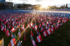 Biden mourns Covid-19 deaths as Trump is expected to pardon loyalists