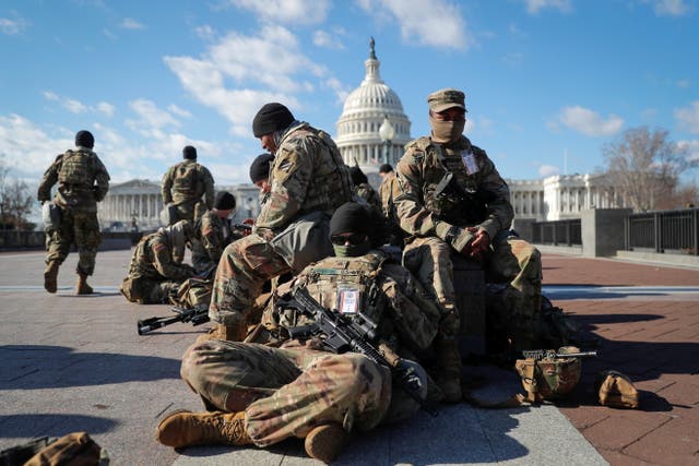 <p>National Guard troops gather in front of the US Capitol in Washington.</p>