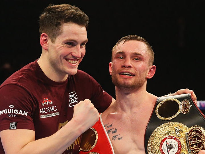 Carl Frampton celebrates with trainer Shane McGuigan after victory over Scott Quigg in 2016