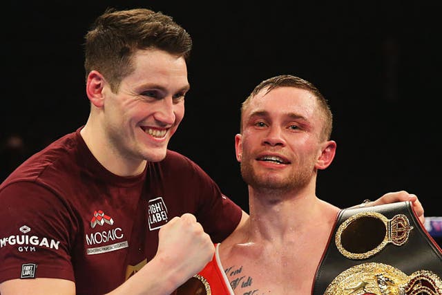 <p>Carl Frampton celebrates with trainer Shane McGuigan after victory over Scott Quigg in 2016</p>